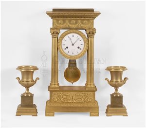 French Classical gilt bronze clock garniture